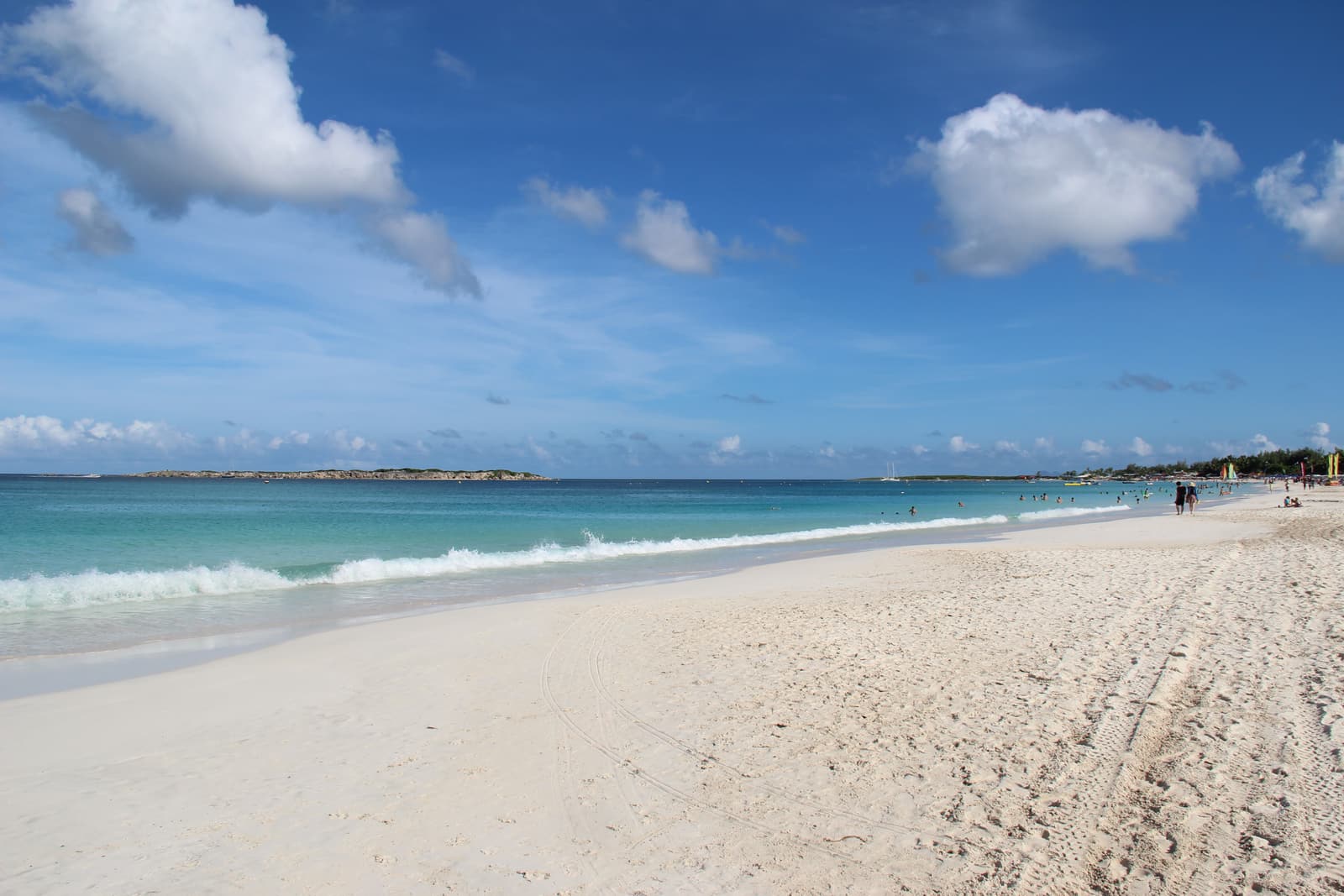 The long white sweep of Orient Bay beach and its turquoise water